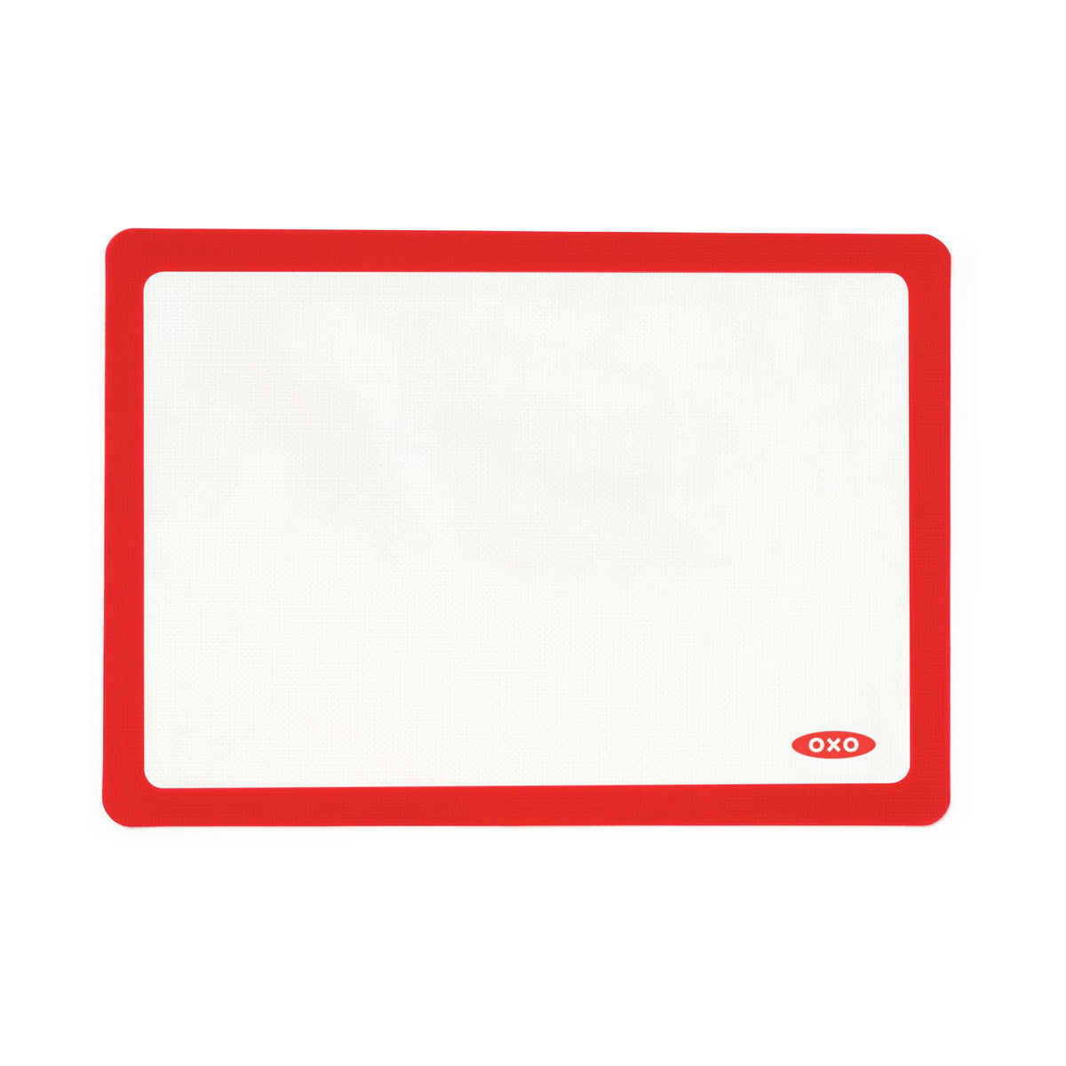 OXO Good Grips mat front on half‑sheet pan showing full coverage and easy release