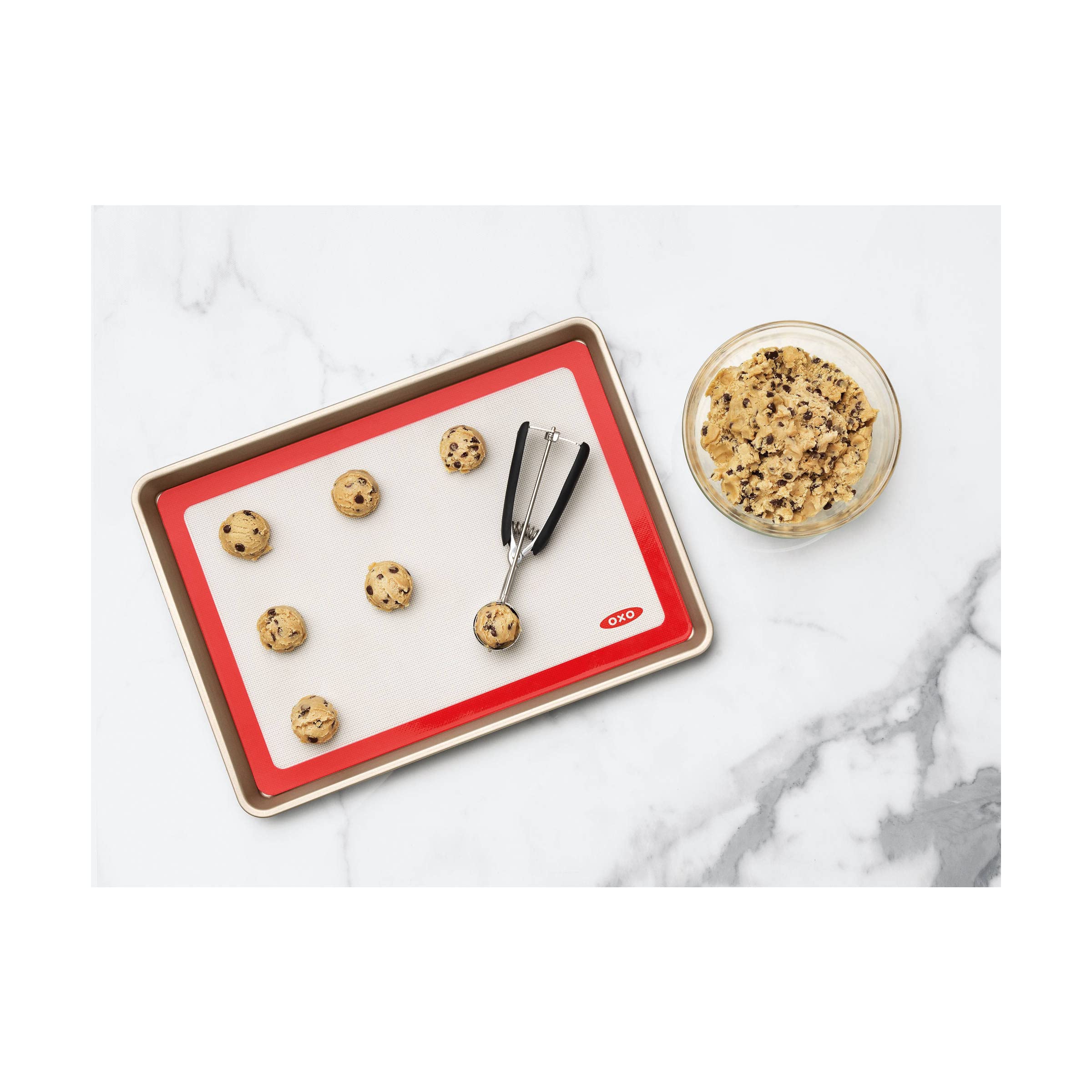 OXO Good Grips mat in oven with cookies demonstrating even browning benefit
