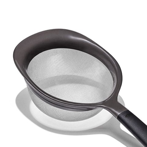 OXO Good Grips mini strainer separating lemon juice from seeds efficiently