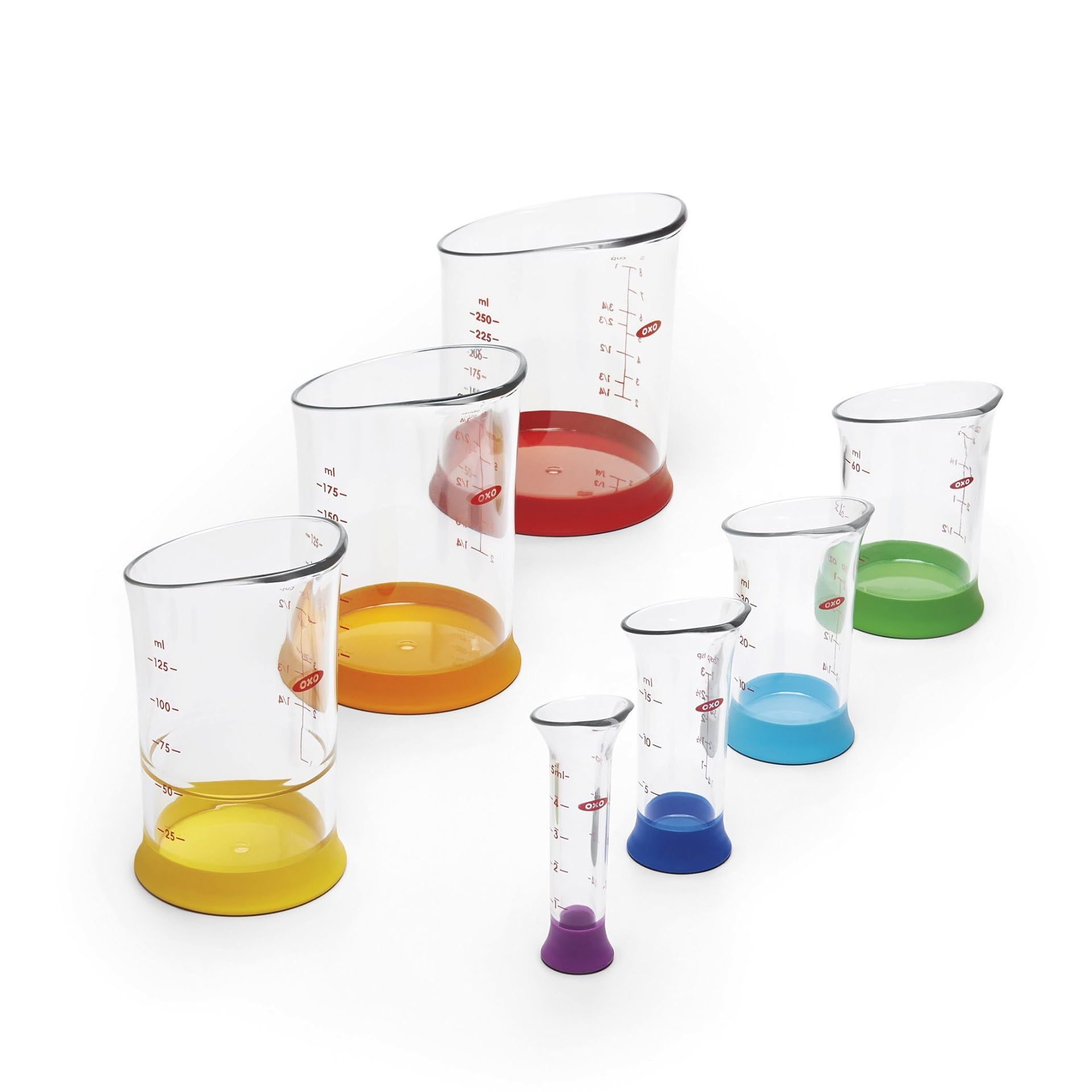 OXO Good Grips pouring milk into bowl showing precise pour control benefit