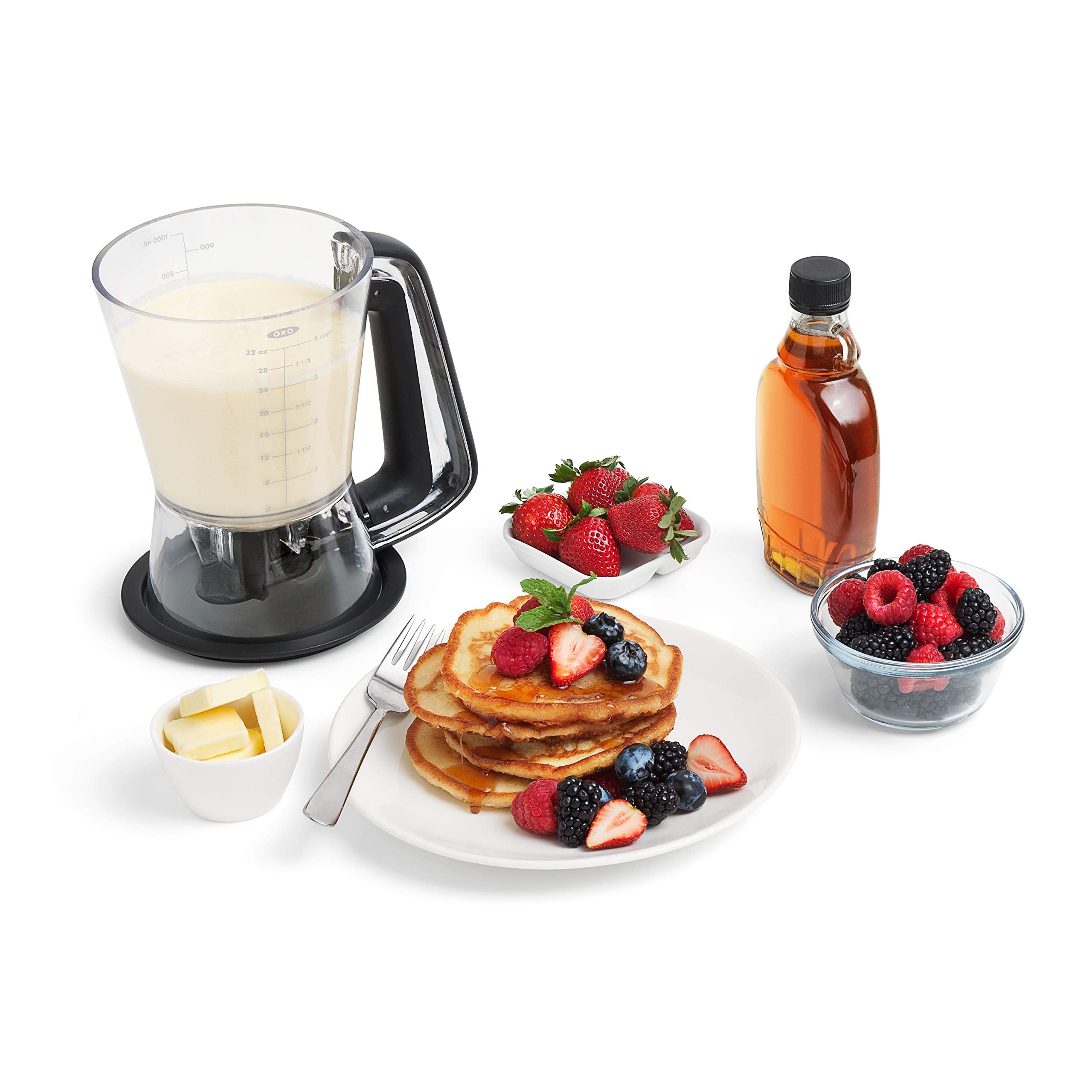 OXO dispenser filling cupcake tin with even portions and less mess