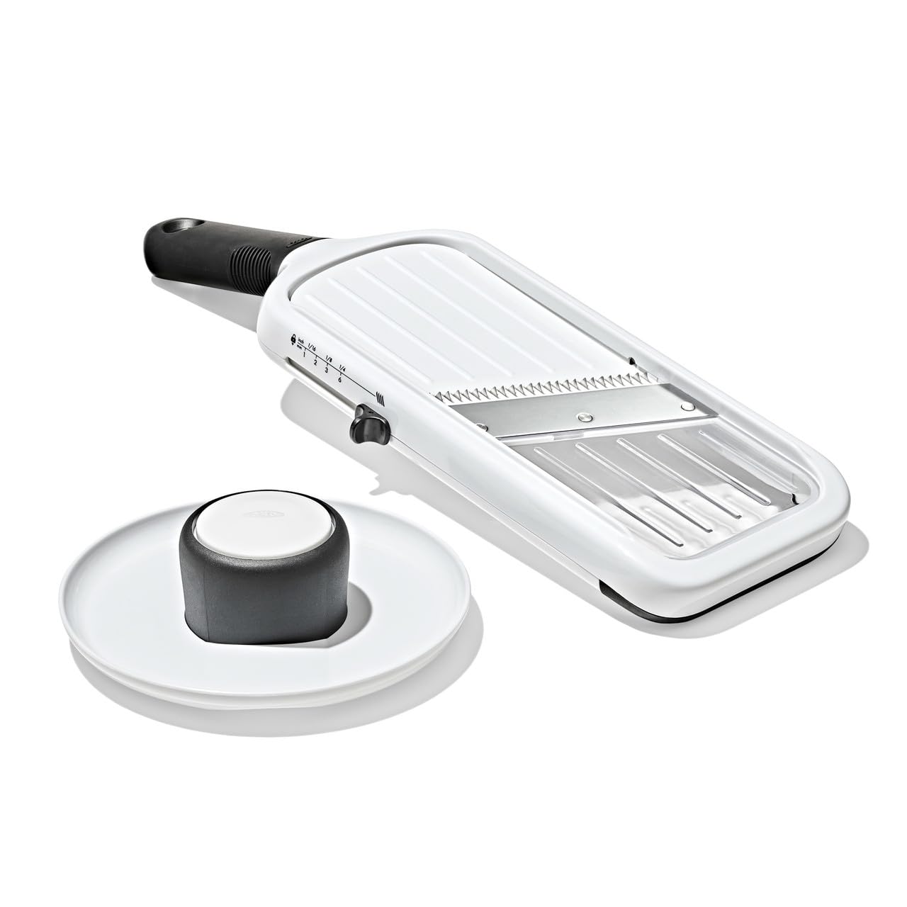 OXO mandoline front view showing compact slicer and stable base for reliable results