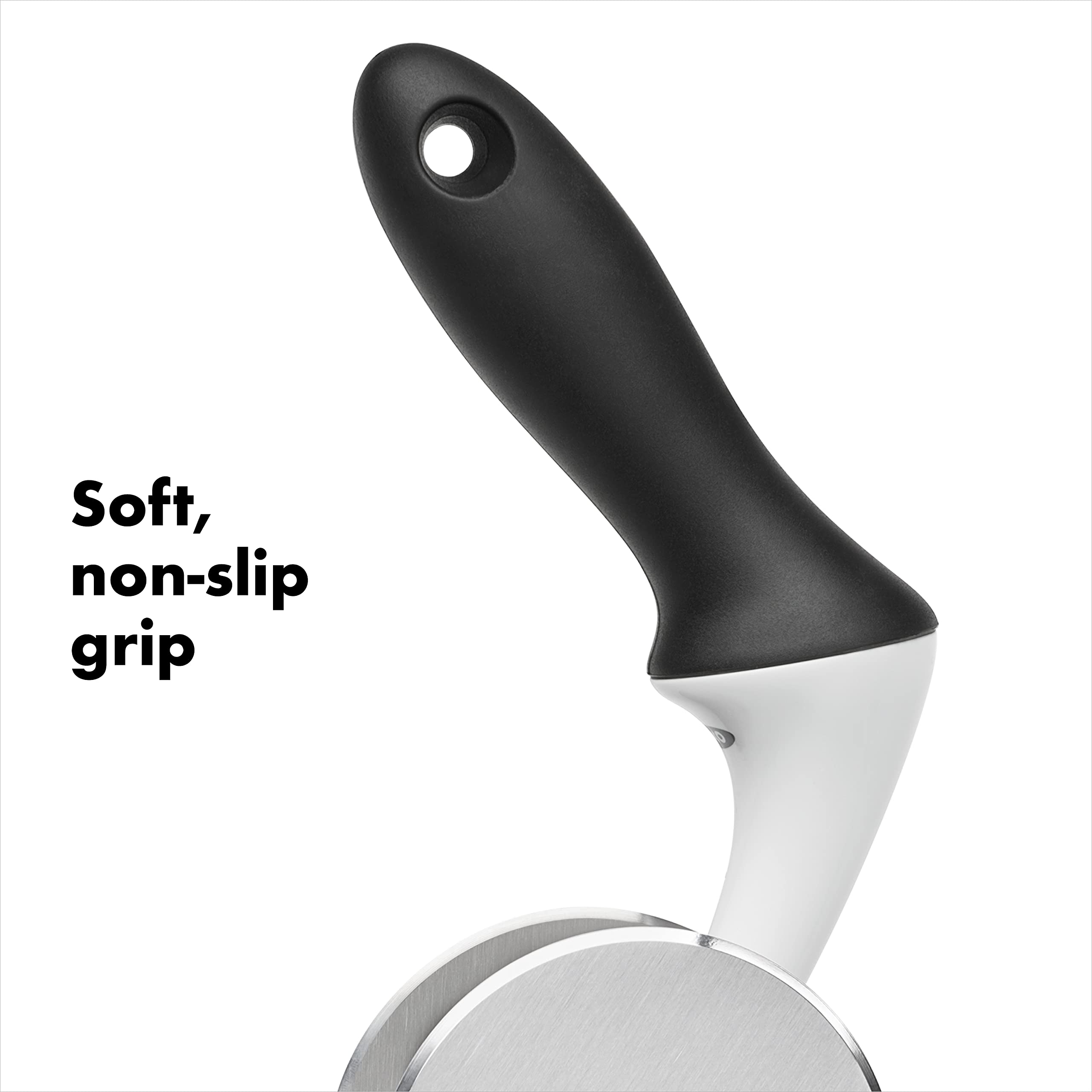 OXO Good Grips chopper being rotated in bowl to quickly chop salad