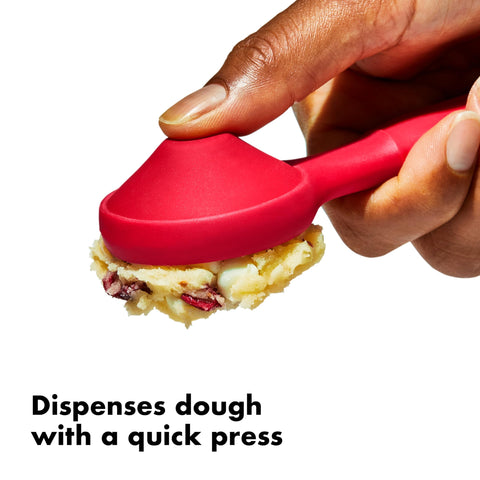 OXO Good Grips silicone scoop head close-up showing smooth edge for clean dough cuts
