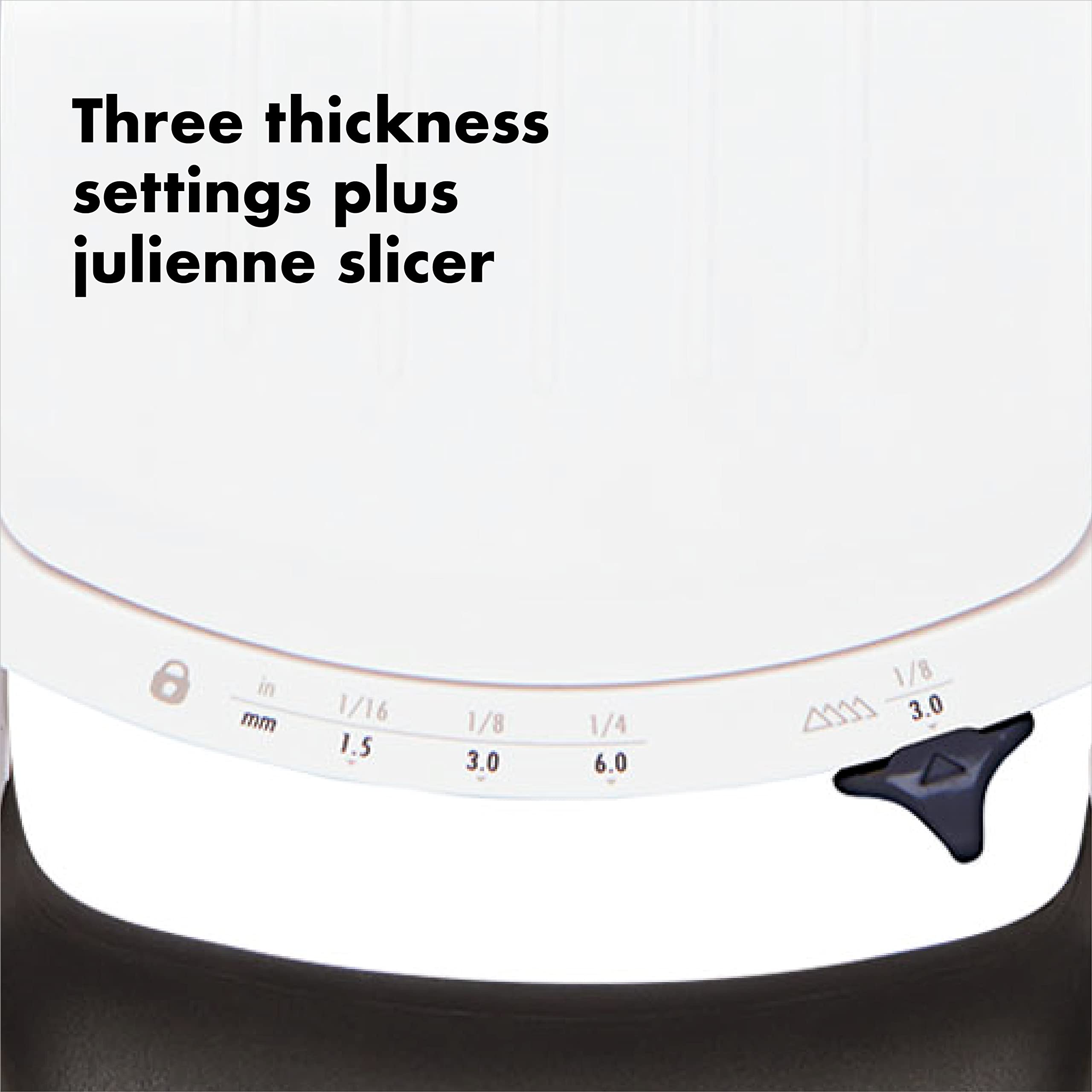OXO Good Grips spring-loaded food holder protecting fingers and ensuring even pressure