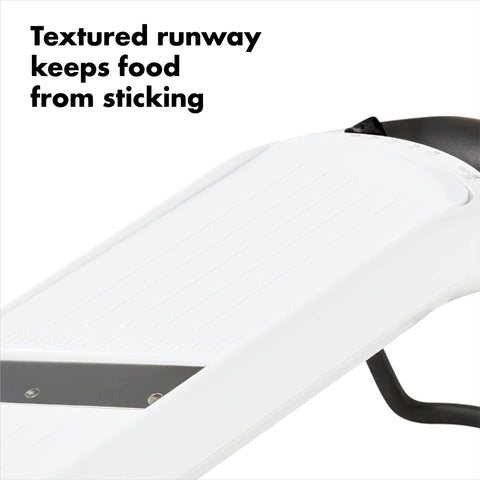 OXO Good Grips slicing cucumber in use for quick uniform vegetable slices