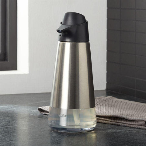 OXO next to hand showing 15-ounce size and practical capacity benefit