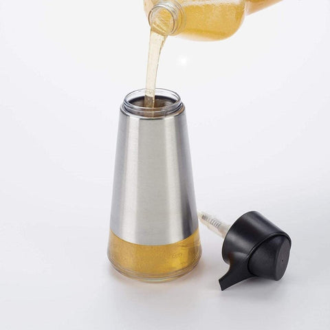 OXO long spout detail directing soap onto sponge for precise use