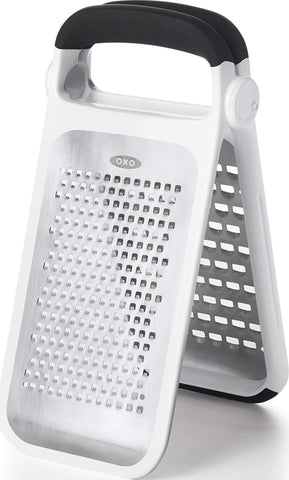 OXO front view of two-fold grater showing dual stainless faces and handle for versatile use