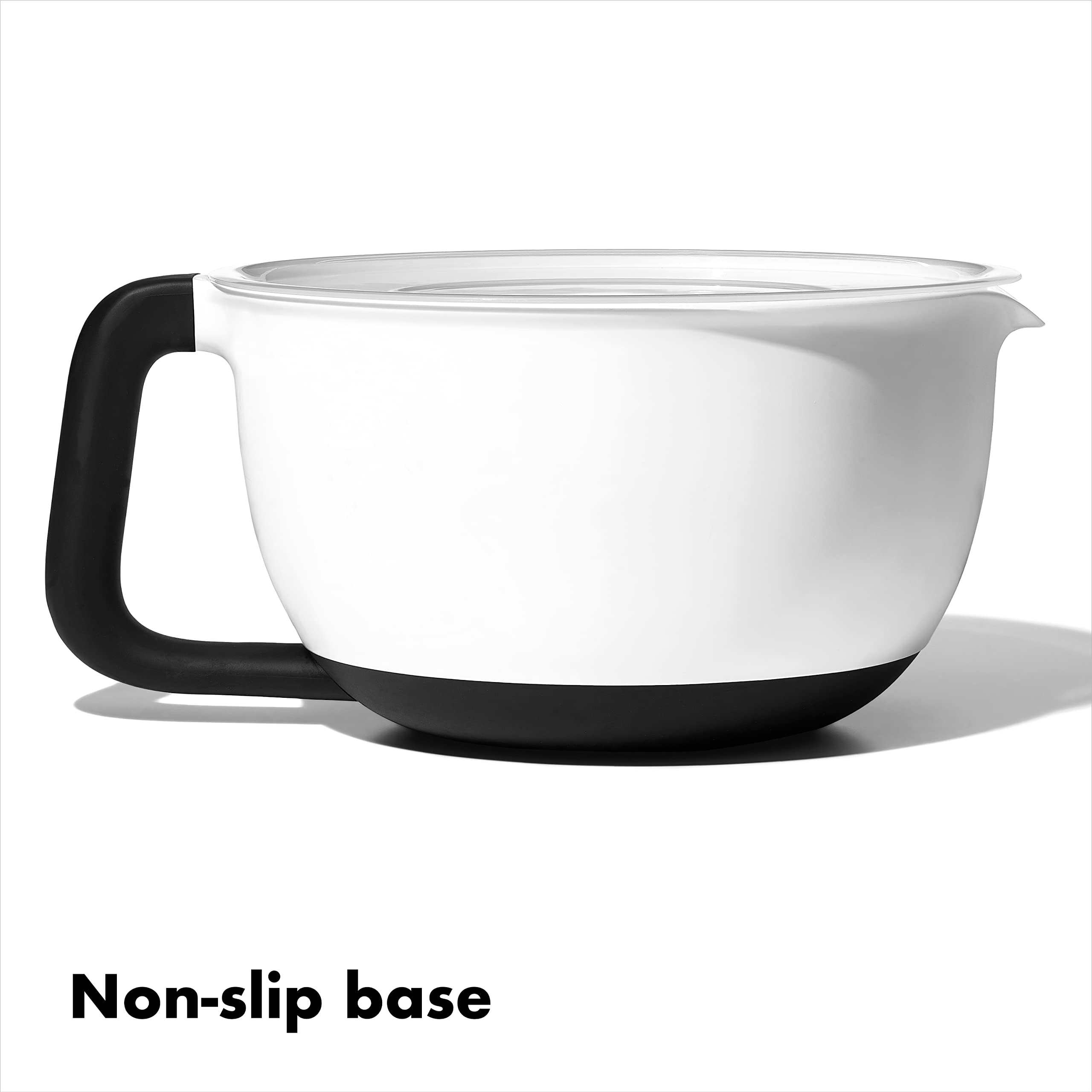 OXO pouring spout mid-pour for precise batter transfer without drips