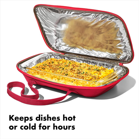 OXO Good Grips front pocket unzipped holding utensils, adds organizing convenience