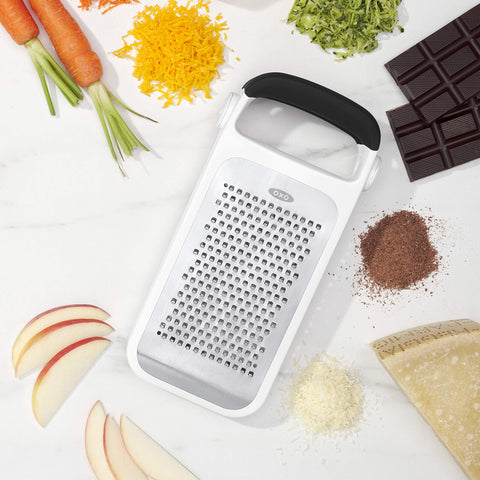OXO snap-on covers protecting grating surfaces and ensuring safe, compact storage