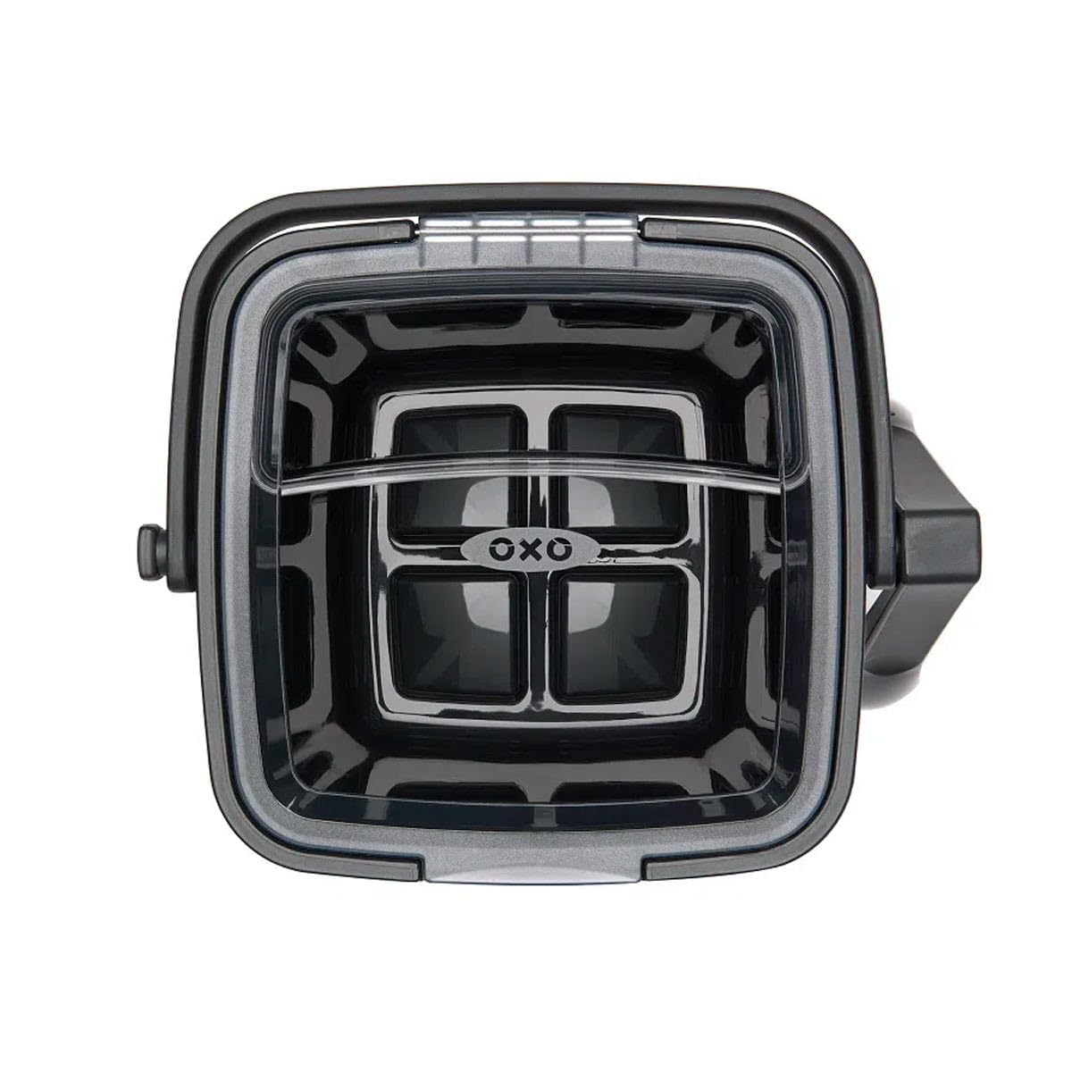 OXO ice bucket beside a glass to show scale, portable and party-ready storage