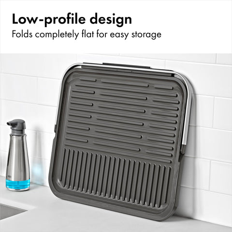 OXO rack inside kitchen sink demonstrating convenient sink placement benefit