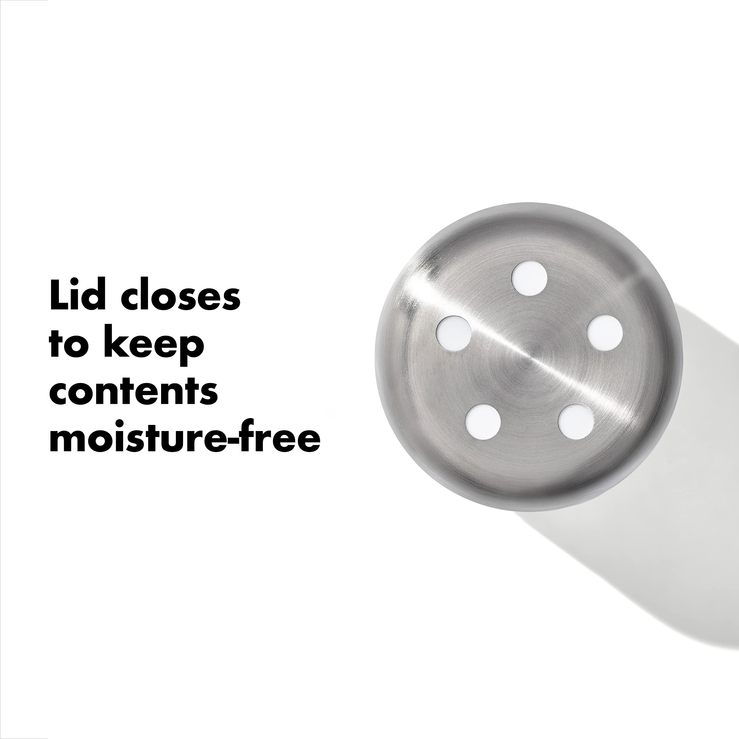 OXO shaker in use sprinkling pepper over food to show controlled seasoning benefit