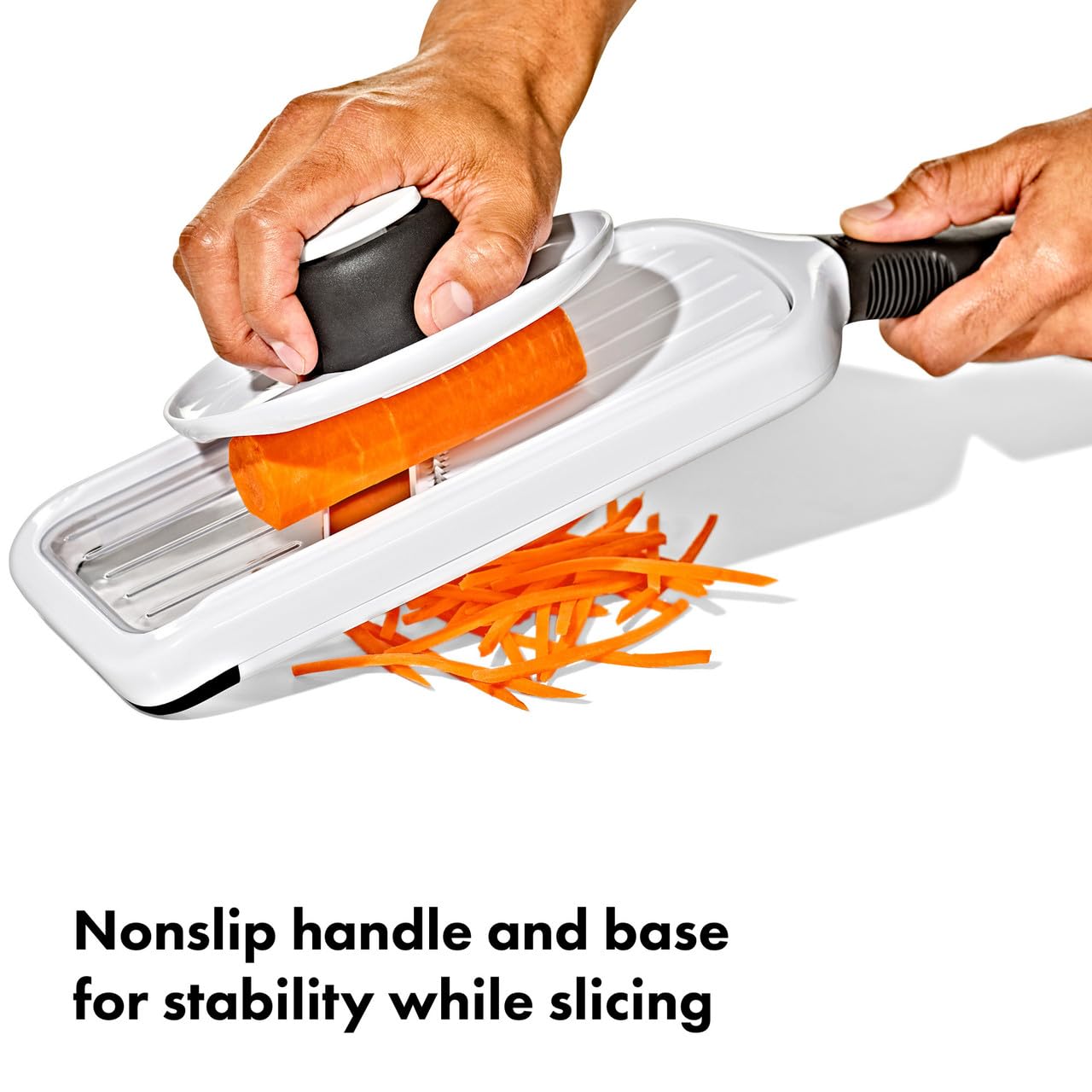OXO mandoline placed in dishwasher rack ready for easy cleanup and care