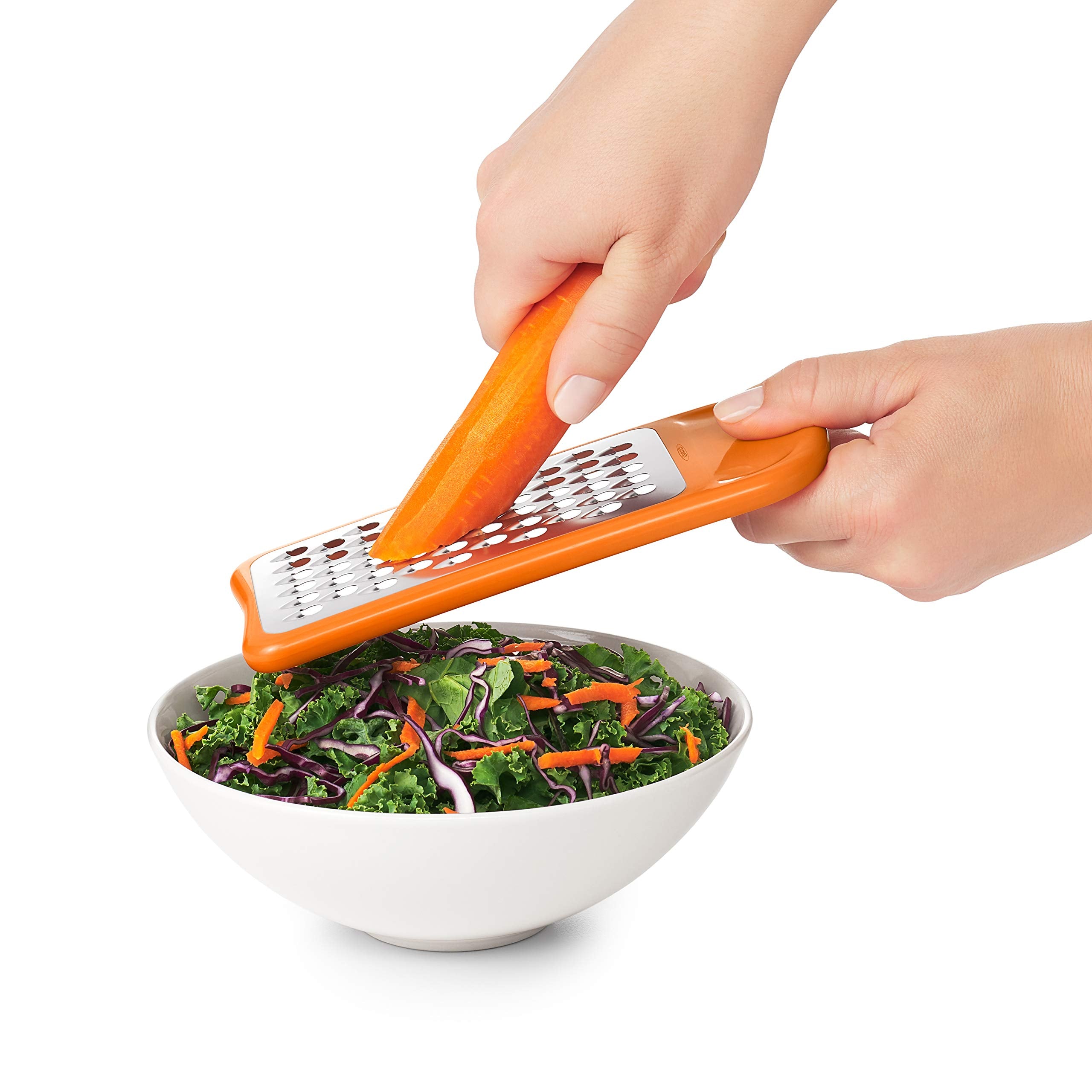 OXO Good Grips grating cheese into cup minimizing spills and simplifying transfer