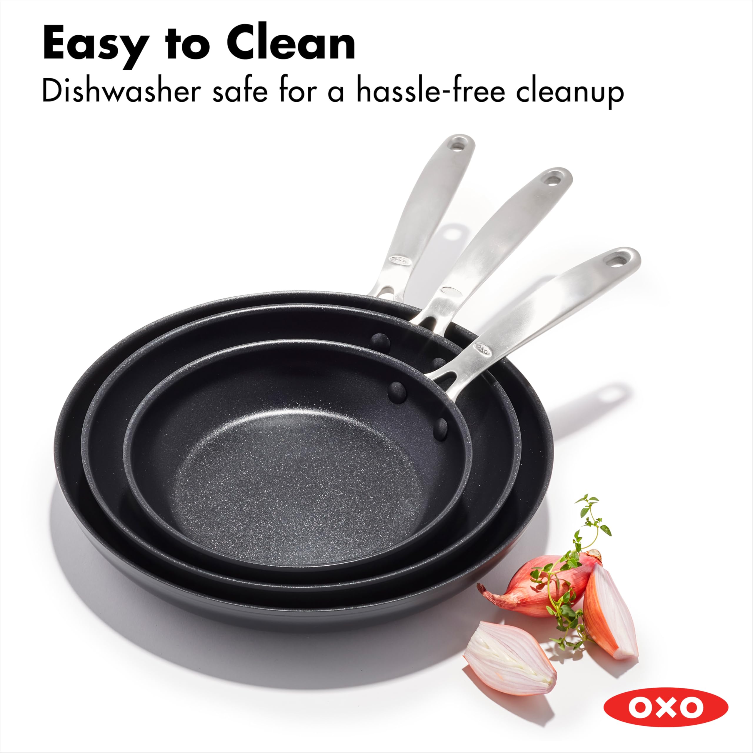 OXO pans nested for compact storage, illustrating convenience and space savings