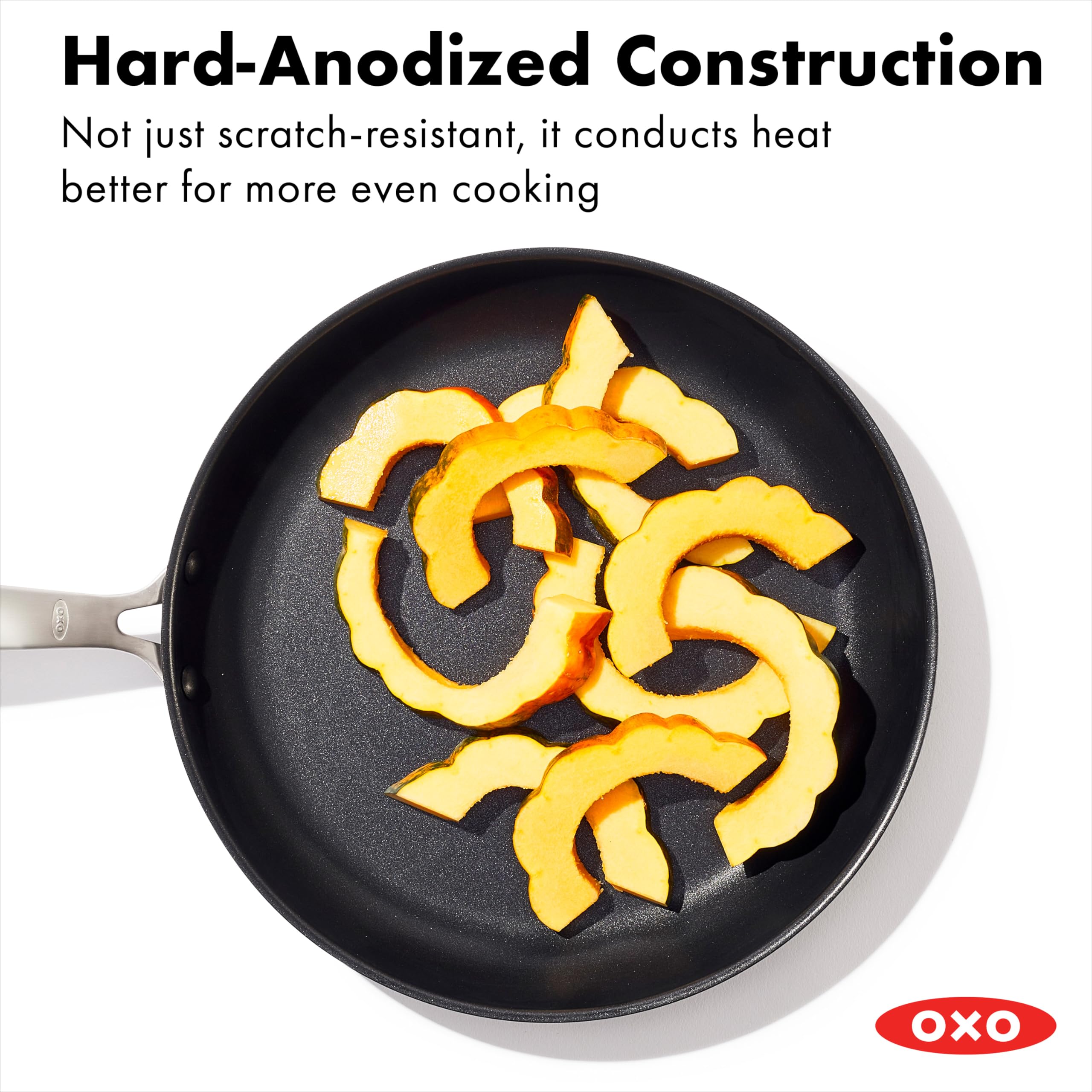 OXO skillet in oven roasting chicken showing even heating and oven-safe versatility