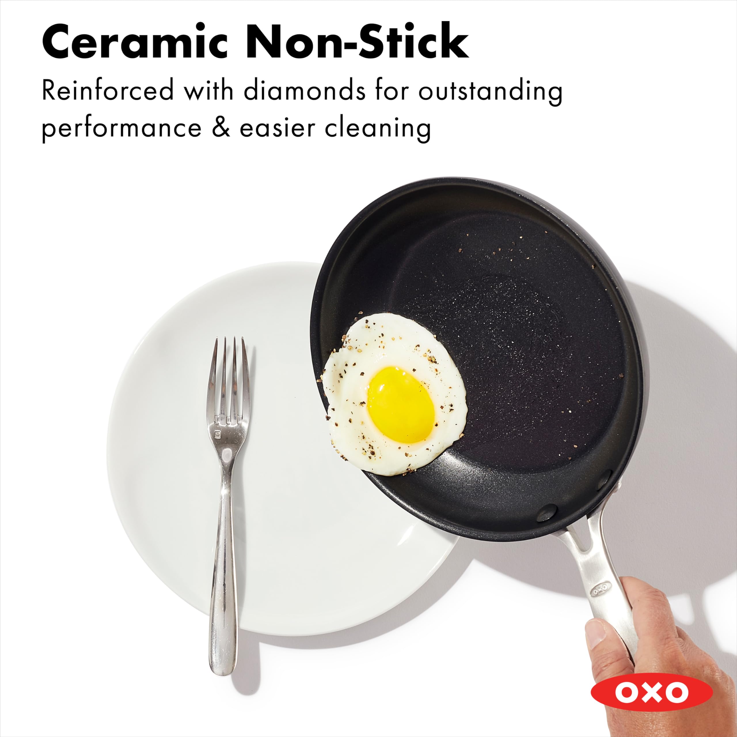 OXO frying pan in use scrambling eggs to show even cooking and quick cleanup