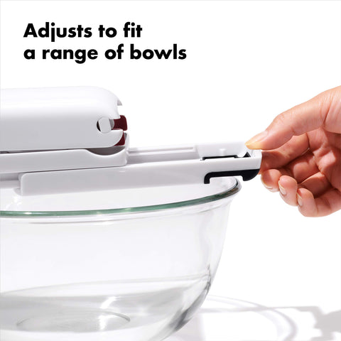 OXO removable pit tray holding stones for easy disposal and cleaning