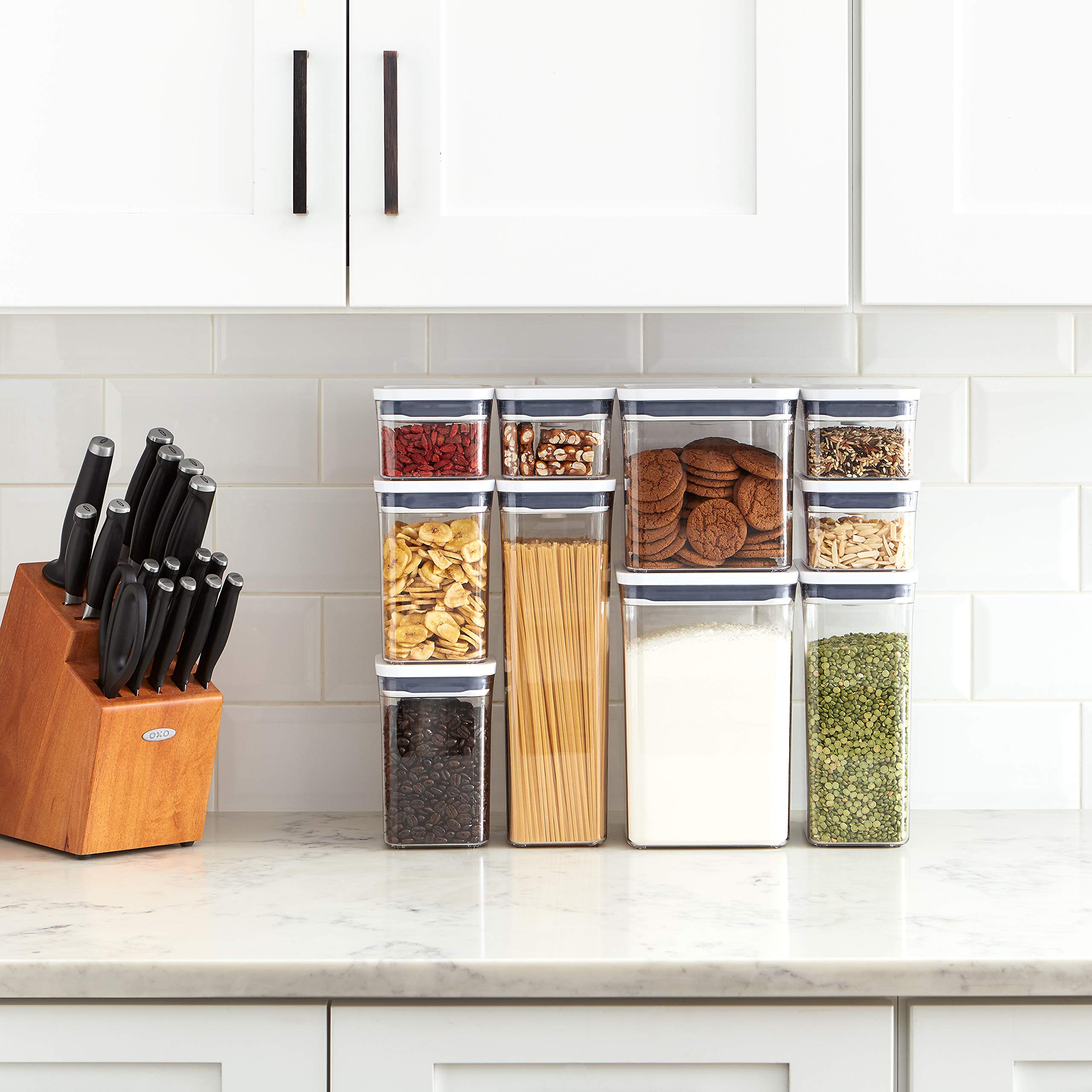 OXO Good Grips POP inside kitchen cabinet showcasing neat, visible storage