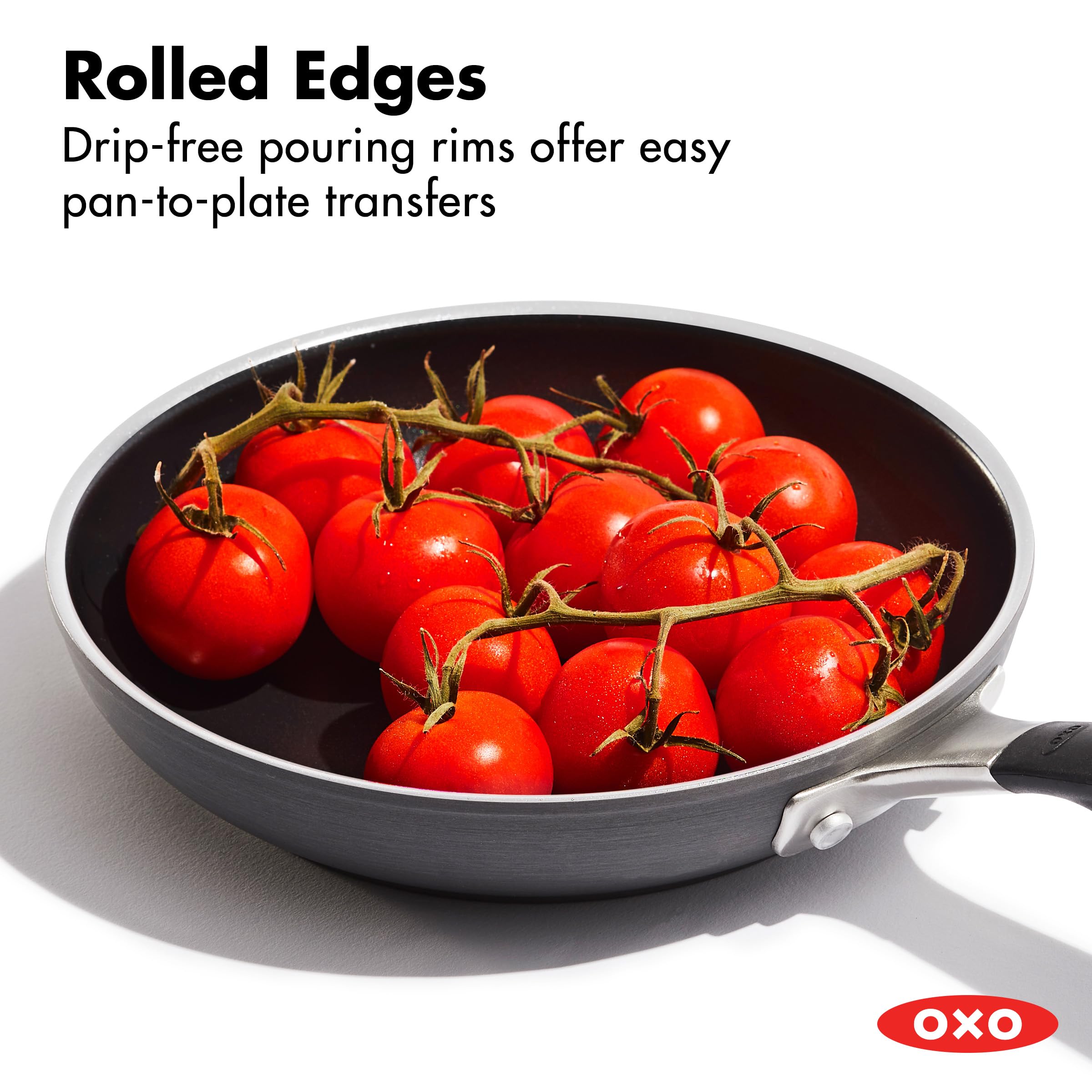 OXO pan showing rolled edge pouring sauce drip-free for clean transfers