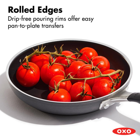 OXO pan showing rolled edge pouring sauce drip-free for clean transfers