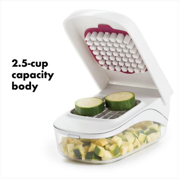 OXO pouring opening in lid directing chopped vegetables into bowl cleanly