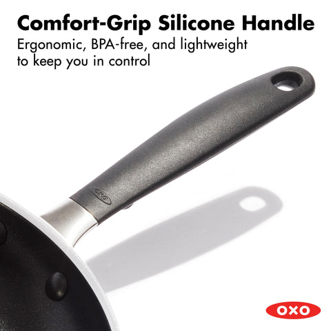 OXO rolled rim pouring detail showing drip-free pour for cleaner transfers benefit