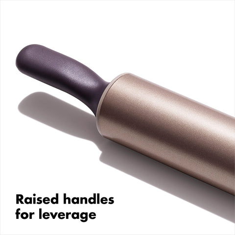 OXO rolling pin in use flattening pizza dough for fast even rolling benefit