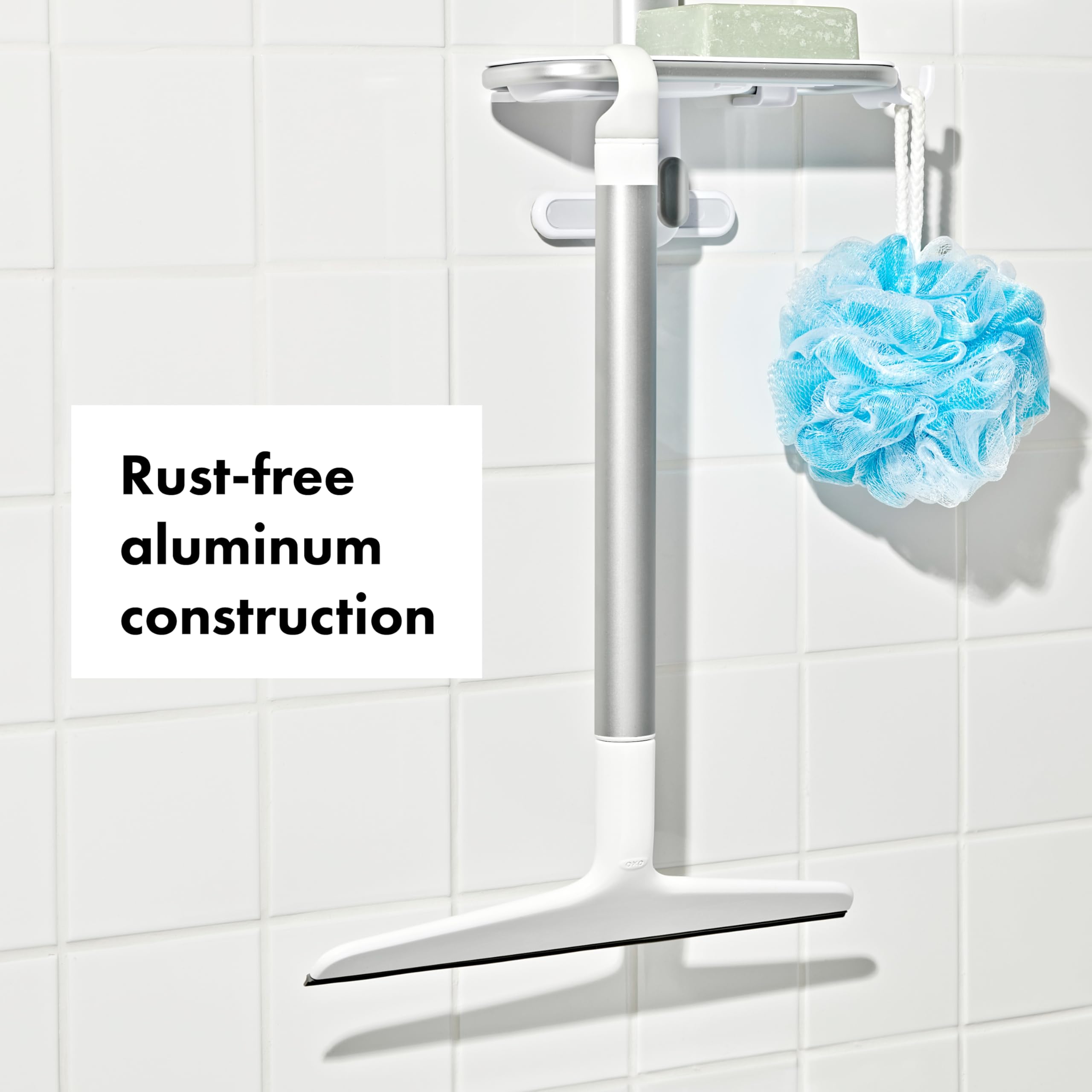 OXO rotating hook detail hanging on showerhead for convenient storage benefit