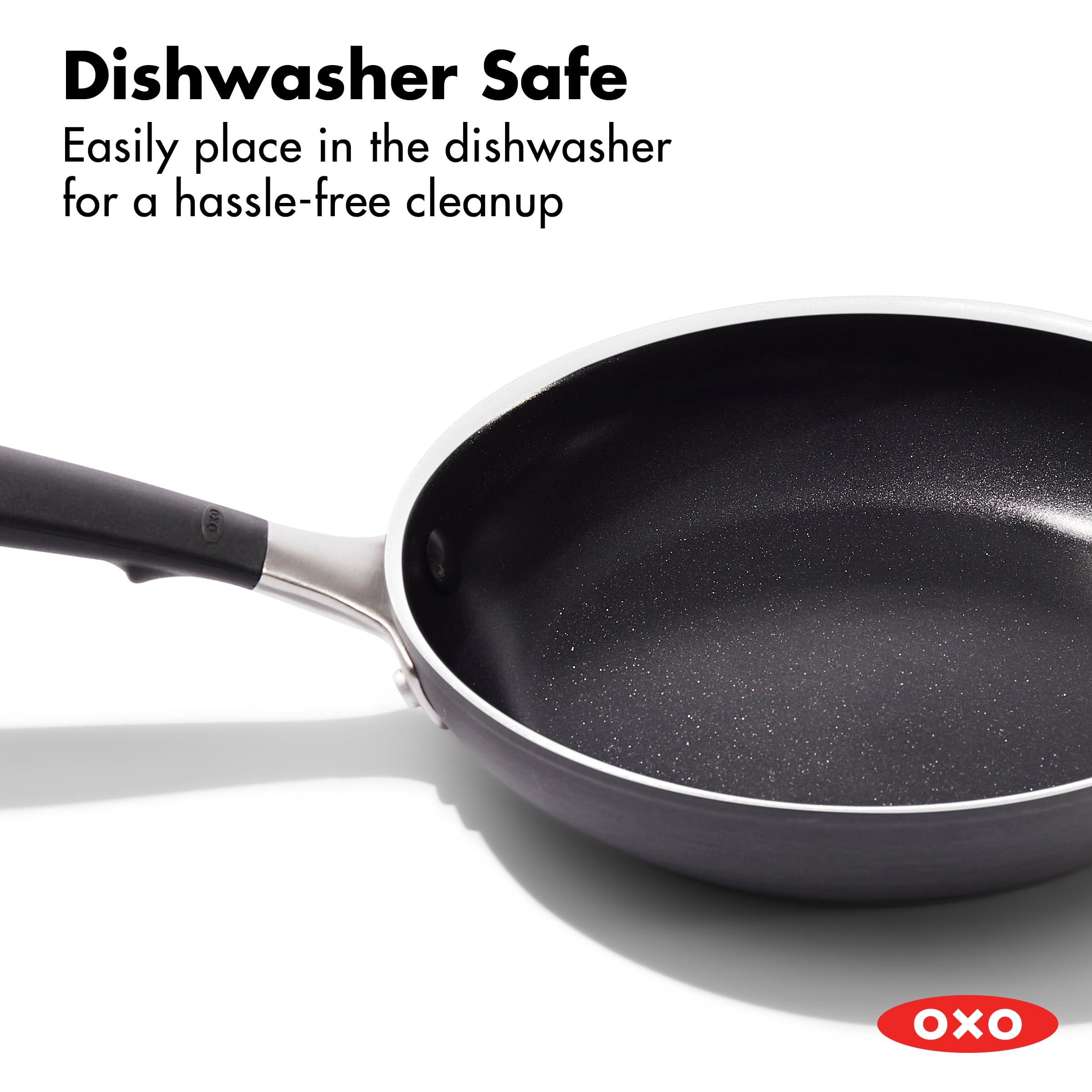 OXO pan beside a hand for scale showing compact 8-inch size and easy maneuvering