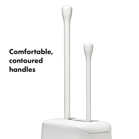 OXO set next to toilet for scale showing compact footprint and tidy storage