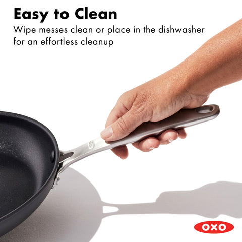 OXO pan beside spatula to show compact 8-inch size for single servings