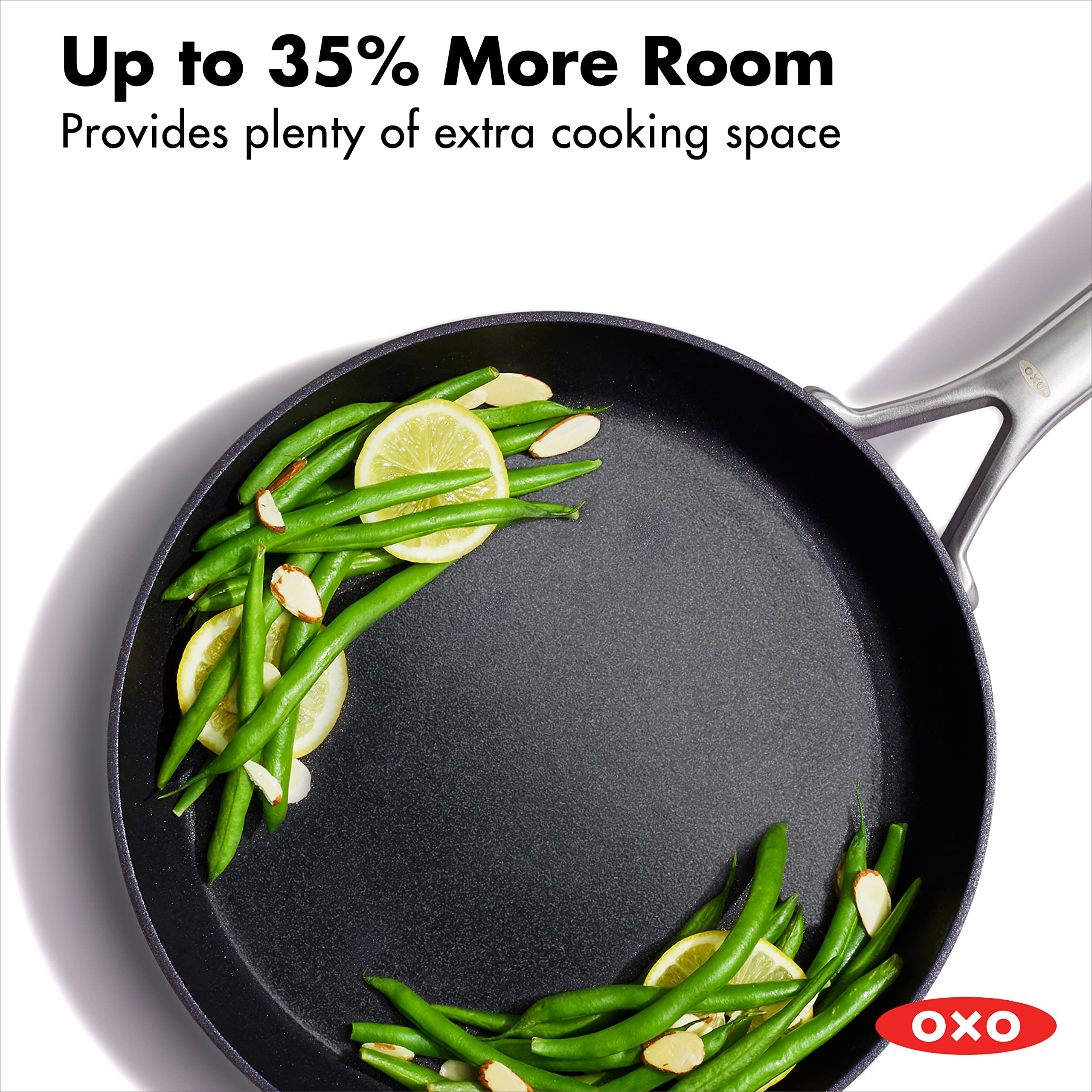 OXO frying pan next to spatula for scale demonstrating increased usable surface
