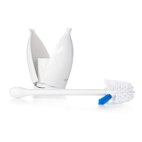 OXO brush set beside toilet showing scale for fitting typical bathrooms