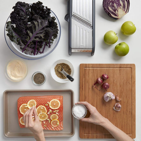 OXO mandoline in use on kitchen counter for fast meal prep