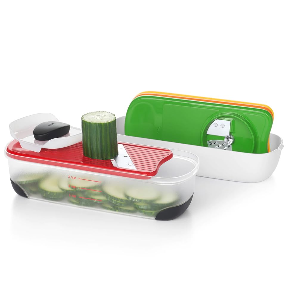 OXO container catching spiralized zucchini noodles for tidy meal prep