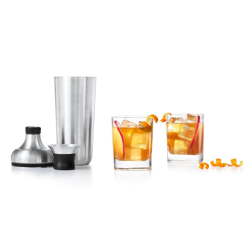OXO shaker mid-shake with ice conveying effective mixing performance
