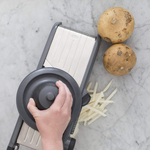 OXO mandoline dial closeup showing easy thickness selection benefit