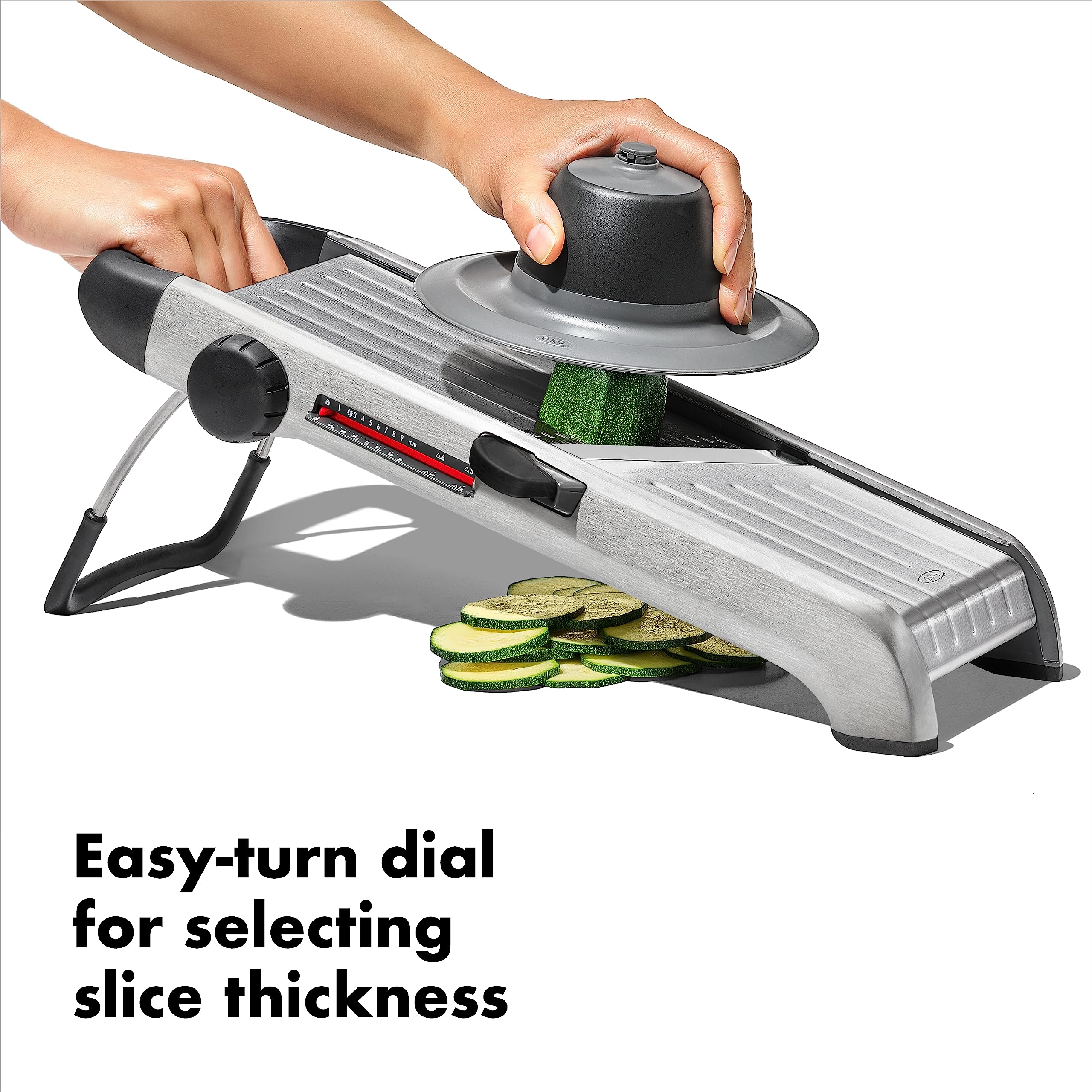 OXO food holder closeup protecting fingers and securing ingredients