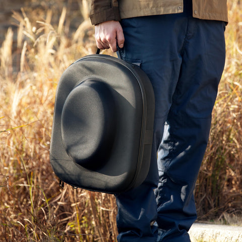 Ozueccr open case holding two cowboy hats secured for safe transport