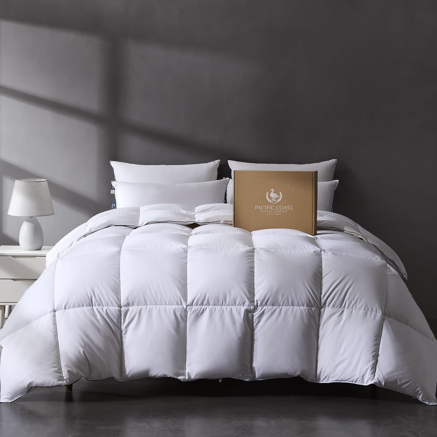 Pacific Coast comforter front packaging showing queen-size and luxury benefit
