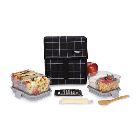 PackIt Black Grid in use on desk keeping lunch chilled and ready