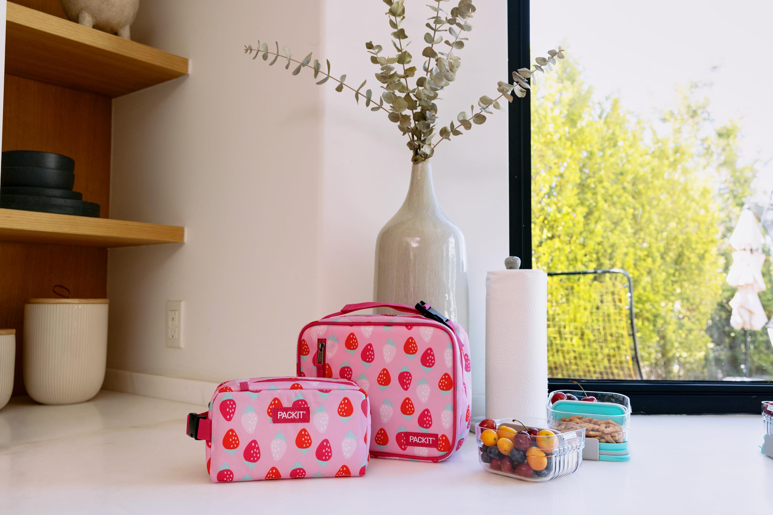 PackIt top buckle handle clipped to bag for hands-free carry and convenience