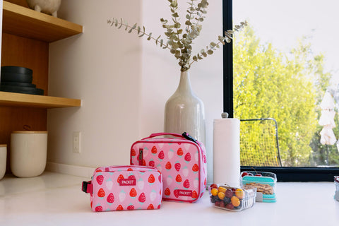 PackIt top buckle handle clipped to bag for hands-free carry and convenience