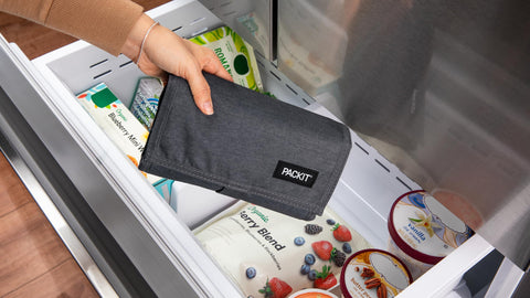 PackIt City Charcoal collapsed flat for compact storage benefit