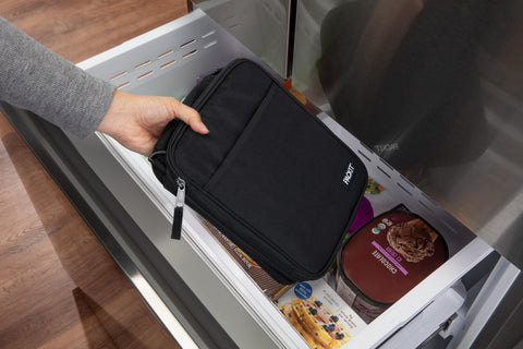 PackIt lunch box worn by commuter showing real-world use and temperature control benefit