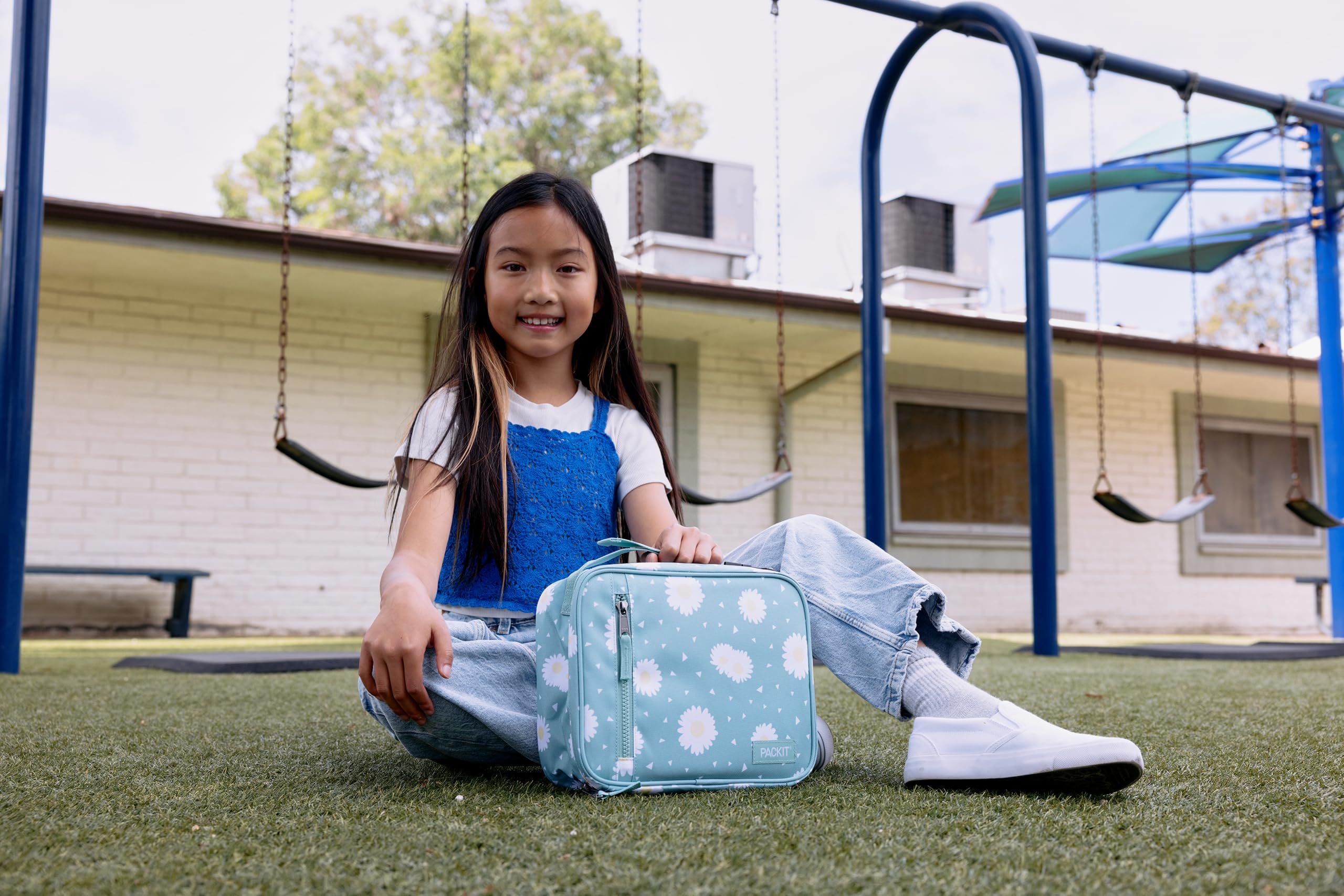 PackIt in-use at school lunch table showing reliable cooling for meals